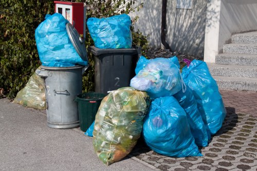 Organised labelled recycling containers in a temporary sustainable rubbish area